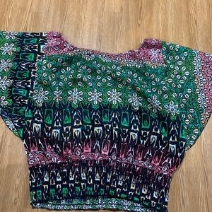 Dress top with stretchy band at the bottom